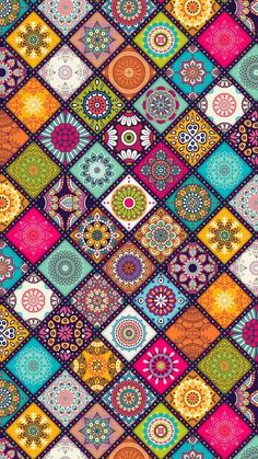 a colorful pattern with many different colors and patterns on it's sides, all in squares