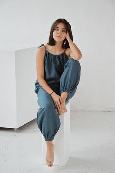 "Ocean wave soft linen trousers with elastic waistband for comfortable fit. Trousers with pockets. Height of my model - 170 cm. / size - S Select size: XS Waist 66 - 68 cm. / (26\" - 26 3/4\") Hips 90 - 92 cm. / (35 1/2\" - 36 1/4\") S Waist 70 - 72 cm. / (27 3/4\" - 28 1/4\") Hips 94 - 96 cm. / (37\" - 37 3/4\") M Waist 74 - 76cm. / (29 1/4\" - 30\") Hips 98 - 100 cm. / (38 1/2\" - 39 1/4\") L Waist 78 - 80 cm. / (30 3/4\" - 31 1/2\") Hips 102 - 104 cm. / (40 1/4\" - 41\") XL Waist 82 - 84 cm. Casual Linen Lounging Pants, Baggy Blue Linen Pants, Summer Harem Pants For Lounging With Relaxed Fit, Summer Lounging Harem Pants With Relaxed Fit, Blue Linen Pants For Loungewear, Blue Linen Loungewear Pants, Relaxed Linen Harem Pants For Loungewear, Blue Linen Lounge Pants, Relaxed Linen Harem Pants