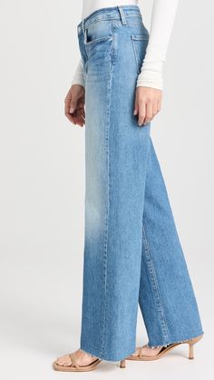 L'AGENCE Tiana Wide Leg Jeans | Shopbop Spring Denim Bottoms With Standard Cut Leg, Spring Cropped Jeans In Washed Blue With Straight Hem, Washed Blue Cropped Jeans With Straight Hem For Spring, Spring Washed Blue Cropped Jeans With Straight Hem, Fall Denim Blue Bottoms With Frayed Hem, Everyday Fall Pants With Frayed Hem, Mid-rise Washed Blue Bottoms For Fall, Medium Wash Flare Jeans With Frayed Hem, Faded Cropped Leg Bottoms With Relaxed Fit