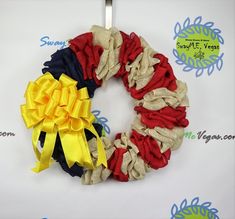 an image of a wreath with ribbons on it