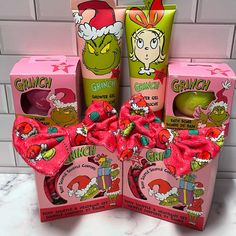 the grinch gift set includes three hand creams and one body lotion