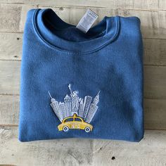 First photo color is Indigo Blue Unisex sizes Crewneck. We can add sleeves text with extra charge. Thank you New York City Sweatshirt, Nyc Shirt, Add Sleeves, Thread Colors, Embroidered Crewneck, Embroidered Sweatshirt, Embroidered Hoodie, Embroidered Sweatshirts, Fitted Sweater