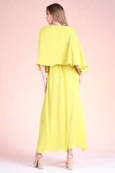 Billowy and breezy, vibrant and eye-catching, our Crinkle Solid Cape Maxi Dress is perfect for brunches, beach days, weddings, and everything in between. This dress features relaxed caped sleeves, deep v-neckline, and maxi length skirt. Deep v neckline Pleated chest detail Elastic-lined waist Half sleeves Cape design Maxi length Center split Lined Crinkle texture fabric finish 100% Polyester Made in USA SKU #: D-7661 Flowy V-neck Breezy Maxi Dress, Breezy V-neck Maxi Dress For Brunch, Yellow Chiffon V-neck Maxi Dress, Flowy V-neck Maxi Dress For Beach Cover-up, Summer Chiffon Maxi Dress With V-neck, Spring Beach Dress, Floor-length And Flowy, Chiffon V-neck Maxi Dress For Brunch, Summer Beach Maxi Dress With Flutter Sleeves, Flowy Beachwear Maxi Dress For Brunch