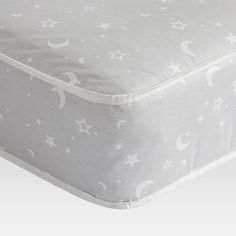 an image of a mattress with stars and moon designs