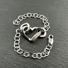 Vintage Diamond Sterling Silver Heart Bracelet, Stamped HDIA 925, Adjustable Length, Bracelet Max Length 18.2cm, Link Width 4.8mm, Heart Max Width 20mm, Secure Lobster Claw Clasp, Weight 6.95 Grams, Lovely Condition Sterling Silver Heart Charm Bracelets, Sterling Silver Bracelets With Heart Charm, Sterling Silver Heart Pendant Bracelet In White Gold, Sterling Silver Heart-shaped Bracelet In White Gold For Anniversary, White Gold Sterling Silver Heart Pendant Bracelet, Silver Heart Cut Bracelets For Valentine's Day, Valentine's Day White Gold Sterling Silver Round Bracelet, Sterling Silver Double Heart Bracelets, Silver Sterling Silver Name Bracelet For Promise