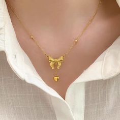 Description:Dainty Gold Bowknot Necklace Specifications:Material: copper, 18k goldColors: goldSize: 40 cm + 5 cm extWeight: 5.8 g/pcs Tie your look together with this adorable Dainty Gold Bowknot Necklace 🎀 Simple yet stylish, it adds a touch of whimsy to any outfit. Makes a great gift for the fashionista in your life! Nice Gifts, Playful Style, Wedding Banquet, Necklace Simple, Different Outfits, Simple Necklace, Exquisite Jewelry, Costume Party, Engagement Party