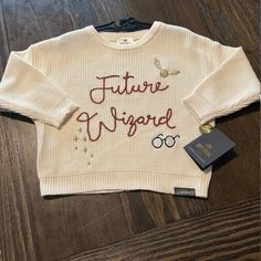 Brand New With Tags Attached Unisex Toddler Sized 3t “Future Wizard” Sweater Colored Cream. Sold Out Online! Harry Potter Onsie, Harry Potter Kids, Unisex Sweater, Toddler Sizes, Kids Tops, Wizard, Colorful Sweaters, Kids Shirts, Sweater Top