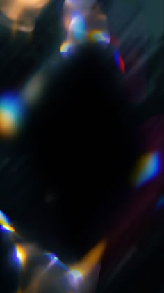 an abstract image with blurry colors and shapes