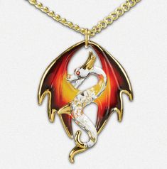 Necklace on a gold chain. The pendant is a clear glass dragon with wings in blakc, red, orange and yellow. It is accented in real gold with crystal eyes. Dragon With Wings, Dragon Necklace, Dragon Pendant, A Dragon, Fantasy Jewelry, Gold Tone Necklace, Glass Necklace, Shades Of Red, 22k Gold