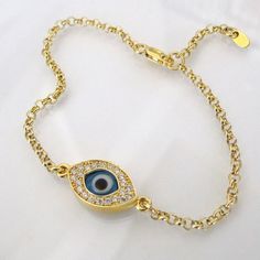 Another trendy design from Theresa Mink of Classic Designs!! Get in the groove and get yourself one today! Choose Yellow Gold Vermeil, Rose Gold Vermeil, or Sterling Silver. To see my Entire Evil Eye Collection, click here:http://www.etsy.com/shop/classicdesigns/search?search_query=evil+eye&search_submit=&search_type=user_shop_ttt_id_5182897&shopname=classicdesigns******************************************************************************************************Have you noticed all the celebr Evil Bracelet, Clean Sterling Silver, Kelly Ripa, Simple Eye Makeup, Richard Gere, Sharon Stone, Demi Moore, Cameron Diaz, Eye Bracelet