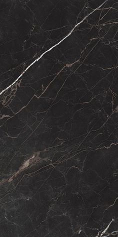 black marble textured with white vein lines