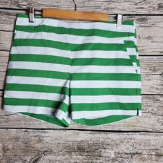 Green & White Stripped New York & Company Shorts Size Large. Waist Approx: 20 Inches Inseam Approx: 15 Inches Z83 Green Bottoms With Vertical Stripes For Summer, Green Vertical Stripes Bottoms For Summer, White Striped Shorts For Spring, Fitted Striped Summer Shorts, Green Graphic Print Short Bottoms, Casual Green Graphic Print Shorts, Green Printed Summer Shorts, Green Beachy Bottoms With Built-in Shorts, Trendy Striped Shorts With Built-in Shorts