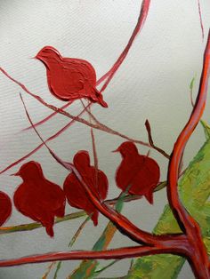 a painting of red birds sitting on a tree branch