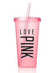 a pink tumbler cup with the words love drink on it and a straw in front