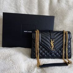 Black Leather, Golden Hardware. Great Condition, No Scratches On Bag, Only Thing Is That Button Is Slightly Faded (Shows On Vid) Comes With Dust Bag, Box, Receipt, And All Authentication Papers. On Hold Ysl Bags Handbags, Bags Ysl, Ysl Bags, Yves Saint Laurent Bags, Ysl Bag, Yves Saint Laurent, Bags Handbags, Saint Laurent, Dust Bag