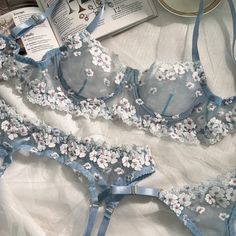 Material: This Blue Cherry Blossoms Sheer Lace 3pc Lingerie Set is made of 95% polyester 5% elastane. Color: Blue This lingerie set includes: Lace lingerie bra Lace lingerie thong/panties Lace lingerie garter belt Size: S, M, L *We recommend taking measurements before ordering lingerie. Different lingerie brands use different size charts, if you want the lingerie set to fit perfectly, please check the size chart below Details: Blue Cherry Blossoms Sheer Lace 3pc Lingerie Set includes matching br Blue Cherry Blossoms, Cute Lingerie Sets, Lingerie Garter Belt, Spring Lingerie, Blue Lace Bra, Lingerie Brands, Pretty Bras, Blue Cherry, Lingerie Inspiration