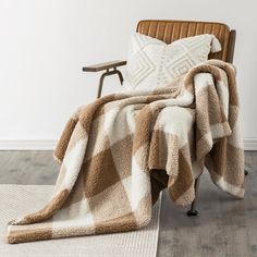 a chair with a blanket on top of it