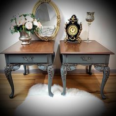 two tables with flowers and a clock on top, one has a fur rug in front of it