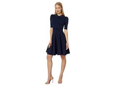 Ted Baker Hillder Delicate Pointelle Knit Dress - Women's Clothing : Dark Blue : Embrace a classic style and add a romantic flair to your look, donning the Ted Baker Hillder Delicate Pointelle Knit Dress. Knitted construction with a fit-and-flare silhouette. Lace-textured bodice. Round collared neckline with tie detailing. Elbow-length sleeves. Zippered back closure. Delicate pleats on the skirt. Hits above the knee. 64% viscose, 32% polyamide, 2% cotton, 2% elastane. Hand wash, dry flat. Import Formal Fitted Knit Dresses, Fitted Knit Dresses For Formal Occasions, Elegant Knit Dresses For Daywear, Fitted Pointelle Knit Dress For Daywear, Elegant Short Sleeve Knit Dress, Elegant Fall Pointelle Knit Dress, Fitted Pointelle Knit Day Dress, Fitted Pointelle Knit Dress With Short Sleeves, Fitted Pointelle Knit Dress