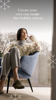 a woman sitting in a chair with snowflakes around her