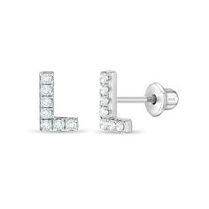 This dainty and glittering letter initial for young girls who love a mesmerizing accessory. A small pair of earrings that feature the initial letter "L" encrusted with clear cubic zirconia stones. Made from a hypoallergenic 925 sterling silver, these studded earrings also feature a safe and comfortable screw back post. These alphabet letter earrings make a great gift for any girl, especially for a beautiful classic look. A complimentary gift box is included for easy gifting! Size: one size.  Gen Initial L, Studded Earrings, Letter Earrings, Initial Earrings, Earrings For Girls, Sterling Silver Initial, Letter L, Initial Letter, Initial Letters