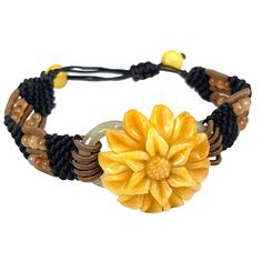 This unbranded yellow jade bracelet is expertly hand-carved and hand-knotted, offering an adjustable size to ensure a perfect fit. The bracelet exudes a unique charm, making it an ideal accessory for women who appreciate artisanal craftsmanship. * Yellow jade bracelet * Hand-carved and hand-knotted * Adjustable size, interior opening 3 inch * Ideal for women * Crafted from jade and cord Features: * Adjustable, Handmade, Stone, Carved Size: Womens Interior opening 3 inch, adjustable Condition: Pr Traditional Adjustable Jade Bracelets, Traditional Adjustable Jade Bracelet, Yellow Beaded Bracelets With Sliding Knot As Gift, Yellow Beaded Bracelets With Sliding Knot For Gifts, Yellow Beaded Bracelet With Sliding Knot As Gift, Spiritual Carved Adjustable Bracelets, Spiritual Adjustable Carved Bracelets, Adjustable Yellow Spiritual Bracelets, Adjustable Yellow Hand-strung Bracelet