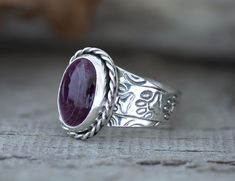 Handcrafted Purple Spiny Oyster Silver Boho Cocktail Ring for her. The setting is an oval cabochon 14mm x 10mm that is in a Bezel setting. The 925 Sterling Silver has been fused, stamped and oxidized. The band is a tapered wide band 1/4" then narrows to 1/8". This ring cannot be resized. Size 10 The eye catching purple hue of the Spiny Oyster shell adds a pop of color to any outfit, while the chunky, unique design creates a trendy fashionable look. Whether you're shopping for yourself or are sea Cute Ring, Artisan Jewelry Handmade, Vero Beach Fl, Sterling Silver Stacking Rings, Southwest Jewelry, Boho Chic Jewelry, Vero Beach, Statement Ring Silver, Sterling Silver Cuff Bracelet