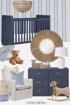 a baby's nursery with blue and white decor