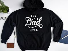 A hoodie with a catchy slogan that is perfect for Father's Day or anytime you want to show your dad how much you love him. M A T E R I A L S → Gildan® Heavy Blend™ Adult Hooded Sweatshirt → 50% Cotton / 50% Polyester → Classic Fit → Fabric 271 g/m² → Preshrunk fleece knit → Double-lined hood with colour-matched drawcord → Double-needle stitching at shoulder, armhole, neck, waistband and cuffs → Pouch pocket → 1 x 1 rib with spandex → Air jet yarns = softer feel and reduced pilling → Tear away la Wedding Sweatshirts, Mermaid Squad, Motivational Hoodies, Wifey Sweatshirt, Be Kind Always, Bride Sweatshirt, Message Positif, Animal Hoodie, Kindness Matters