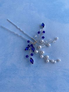 Meet our new design - the silver blue hair pin with blue rhinestones, glass beads and pearl beads. We made it from silver colored wire, different shapes of glass beads and pearl beads. Add some extra glam to your look with the unique design of the silver blue hairpiece with buds in clusters. Perfectly suitable for bridal or prom hairstyle, this gorgeous silver blue hair stick will complete your wedding day look. Add a touch of bohemian style to your hair and glam up your outfit. Soft, flexible a Blue Hairpiece, 2025 January, Silver Blue Hair, Sky Blue Hair, Blue Hair Pins, Blue Wedding Hair, Bridal Hair Pin, Prom Hairstyle, Bridesmaid Hair Accessories