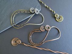 This hair slide is made with thick gauge solid copper wire or solid brass wire, was oxidized to emphasize all the details. The barrette was carefully shaped and wrapped to give a great all day hold for most hair types. It can be bent to suit your style and volume of hair. Bending both the clip and the pin will give you maximum fit. Slide part can also be used separately. The barrette measures 6.5cm/ 2.4in long and 3.4cm/ 1.3in width, the slide has 13.5cm/ 5.3in. All of my items are 100% handmade Brass Hair Pin, Bun Holder, Metal Hair Clips, Jewelry Hair, Hair Slide, Pearl Hair, Barrette Clip, Hair Barrettes, Hair Types