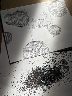 two greeting cards with the words happy birthday written on them next to some confetti sprinkles