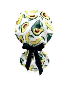 an avocado and banana print hair bow on a white background with black ribbon