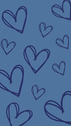 a blue background with many hearts drawn on it