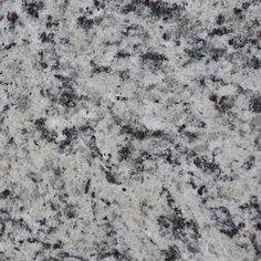 an image of granite that looks like it is white and black with red dots on it