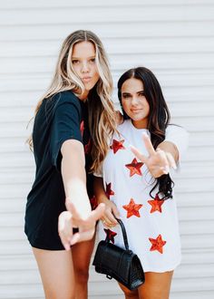 White & red sequin star patched tee. Perfect for 4th of July or Gameday fit. Cotton Blend White Tee Materials may have natural variations Colors may vary from different viewing devices Model wearing a size Large Comes Regular Length ☆For a cropped or distressed look add customizations to the notes section at checkout. ☆Please note: This item is a handmade item and no two items will be perfectly alike and will vary because of the dye process ☆PROCESSING & SHIPPING: Preorder Estimated Time- Ships Trendy Summer T-shirt With Star Patch, Oversized Star Print Summer Tops, Red Star Print Top For Summer, Red Short Sleeve Top With Star Print, Trendy Star Patch Tops For Spring, Trendy Tops With Star Patch For Spring, Trendy Spring Tops With Star Patch, Cotton T-shirt With Star Patch For Summer, Red Star Print Crew Neck Tops