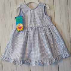 Fresh Produce Lavender Gingham Jumper Dress Size: 6 Months 100% Cotton Fabric Lavender Purple/White Gingham Print New With Tags Made In The Usa D 16 Cotton Gingham Plaid Dress With Ruffles, Gingham Plaid Cotton Dress With Ruffles, White Cotton Plaid Dress For Spring, Cute Cotton Plaid Dress For Spring, Cute Plaid Cotton Dress For Spring, Gingham Print, Lavender Purple, Fresh Produce, Jumper Dress