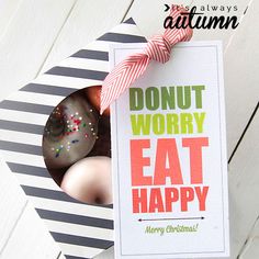 an open box with donuts in it that says, donut worry eat happy