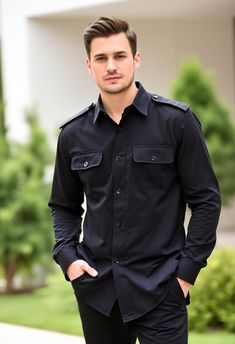 This black military-style utility shirt brings together functionality and fashion. Featuring buttoned pockets, shoulder epaulets, and a modern fit, it's ideal for those who value style and utility. The sleek black design makes it perfect for casual wear or smart-casual occasions, offering versatility and a polished look. All shirts come in standard US sizes Made in Black color thick cotton fabric.Fit for mountaineering, hiking, traveling, camping, running and other outdoor activities Dry Clean Only: Made in India Black Long Sleeve Top With Flap Pockets, Black Shirt With Flap Pockets For Work, Black Workwear Shirt With Flap Pockets, Black Button-up Shirt With Flap Pockets, Black Military Long Sleeve Tops, Black Shirt With Flap Pockets For Fall, Collared Workwear Shirt With Cargo Pockets, Black Long Sleeve Military Top, Black Business Shirt With Pockets