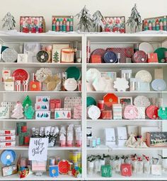 the shelves are filled with many different types of christmas decorations and gifts for sale on them