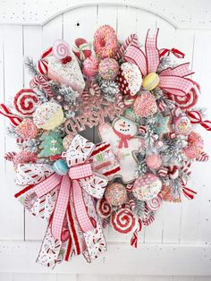 a wreath made out of candy canes and cookies