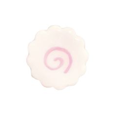 a white lollipop with pink swirls on it's side against a white background