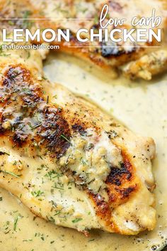 two pieces of chicken covered in gravy on a plate