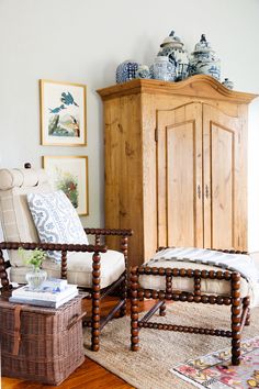 a living room filled with furniture and decor on top of a hard wood floored floor