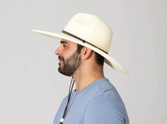 ***SORRY, NO SHIPPING! IN STORE PICKUP AVAILABLE IN DRIPPING SPRINGS, TX*** Love this hat's versatility! Looks fabulous on both male or female. Sports a large brim with strappy leather crown accent and adjustable chin toggle. The Ultrabraid Sun Hat material has been given the highest UPF of 50+ for excellent sun protection! Brim is 5" in width and crown is 4.5" high. Coffee and Pale White Leather Crown, Female Sports, Pale White, Dripping Springs, Vintage Soul, Sun Hat, Sun Hats, Sun Protection, Springs