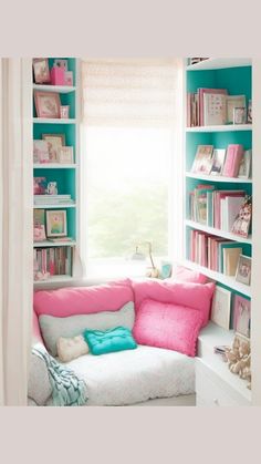 a room filled with lots of bookshelves next to a white dresser and window