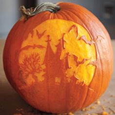 a carved pumpkin sitting on top of a table