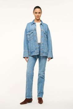 The Biggest Jean Jacket is our oversized must-have jacket from the Wrangler + STAUD collection. Drop shoulder and exaggerated cuff create a laid-back look, featuring our STAUD belt loop detailing. Fall Denim Blue Rigid Denim Outerwear, Classic Rigid Denim Outerwear For Fall, Medium Wash Rigid Denim Outerwear For Fall, Medium Wash Relaxed Fit Rigid Denim Outerwear, Relaxed Fit Blue Denim Outerwear, Medium Wash Long Sleeve Rigid Denim Outerwear, Fall Medium Wash Rigid Denim Outerwear, Long Sleeve Medium Wash Rigid Denim Outerwear, Long Sleeve Rigid Denim Outerwear For Fall