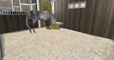 a horse standing on top of a pile of hay