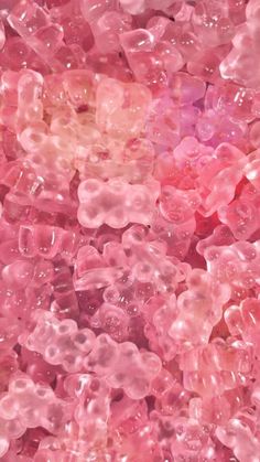 some pink bubbles are in the middle of a large pile, and it looks like they're floating or floating